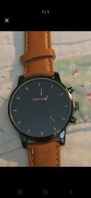 Geneva Men's Analog Wristwatch Black Dial Brown Leather Strap Baton Indexes - Image 1