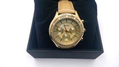 DKNY - DONNA KARAN Lady's Wristwatch 14K Yellow Gold 44.2g (I-121) - Image 1