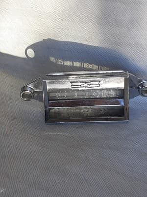 Vintage 60s Chevy Radio Chrome Faceplate Bowtie - Image 1