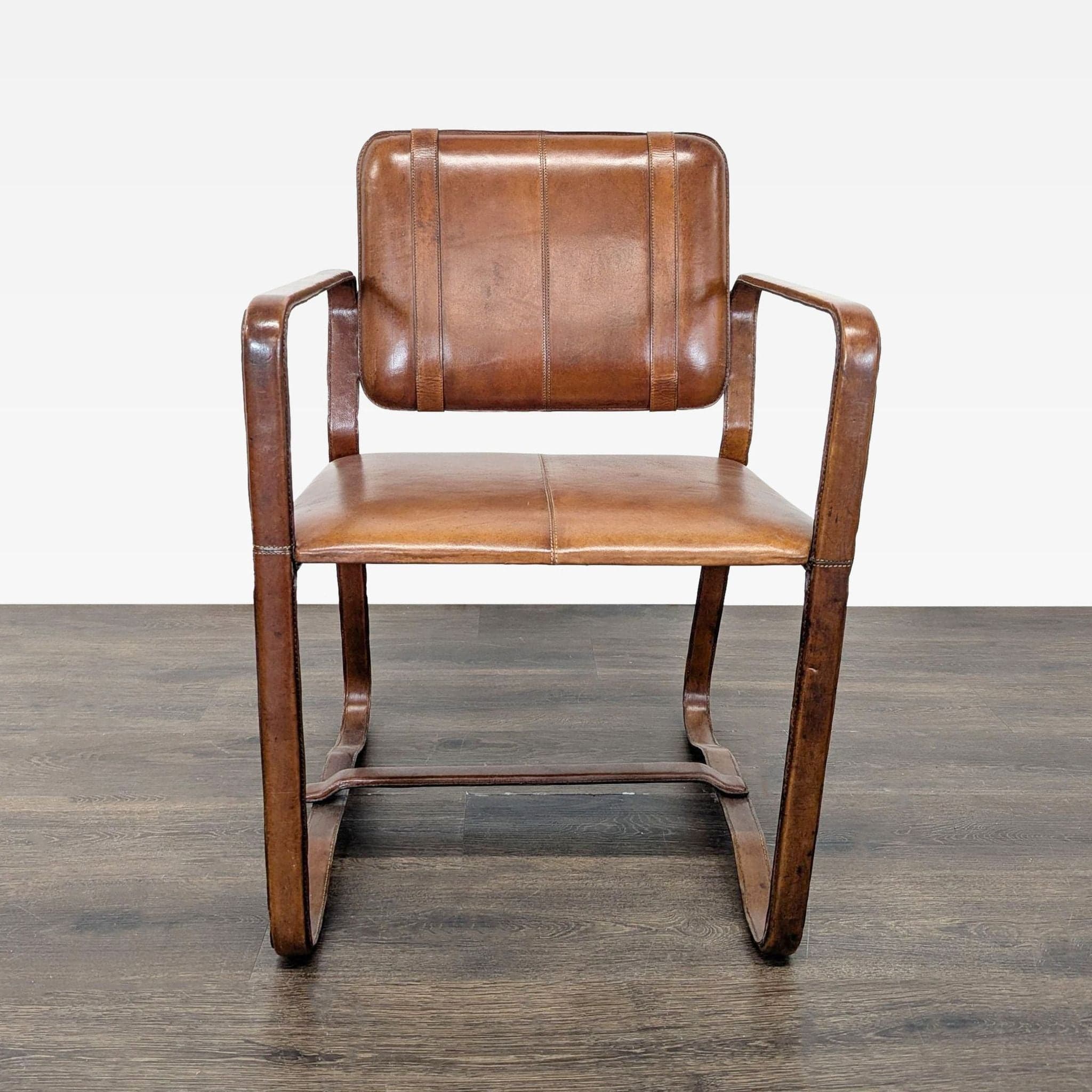 Brown Leather Buckle Lounge Chair with Curved Wooden Frame - Image 1