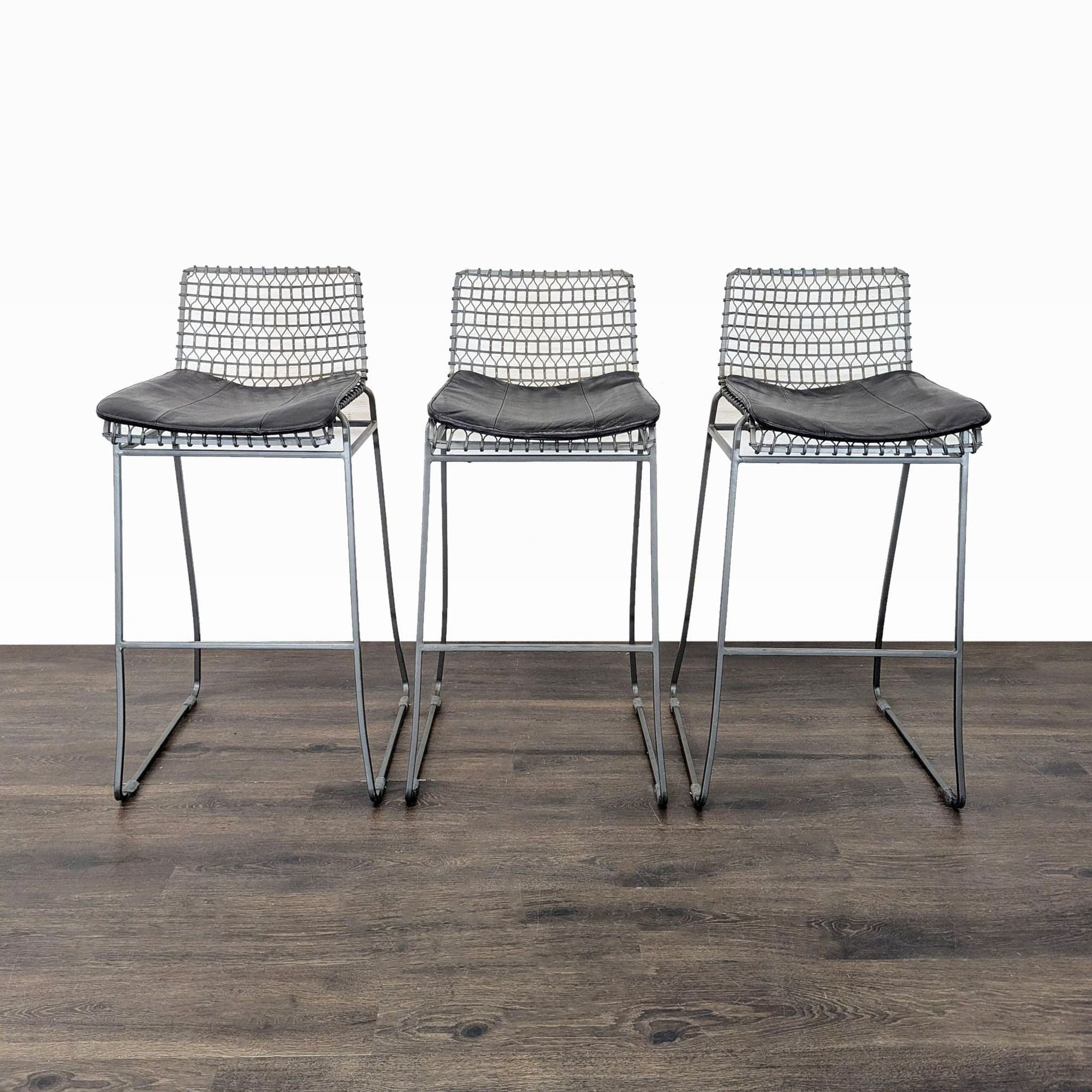 Set of Three Crate & Barrel Tig Metal Bar Stools with Cushions - Image 1