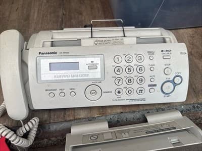 Panasonic KX-FP205 Compact Plain Paper Fax/Copier/Phone Caller ID - Image 1