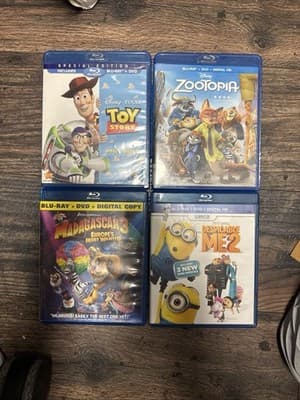 Lot of 4 Disney Blu-ray,Zootopiaa Toy Story,Madagascar 3, Despicable Me2 - Image 1