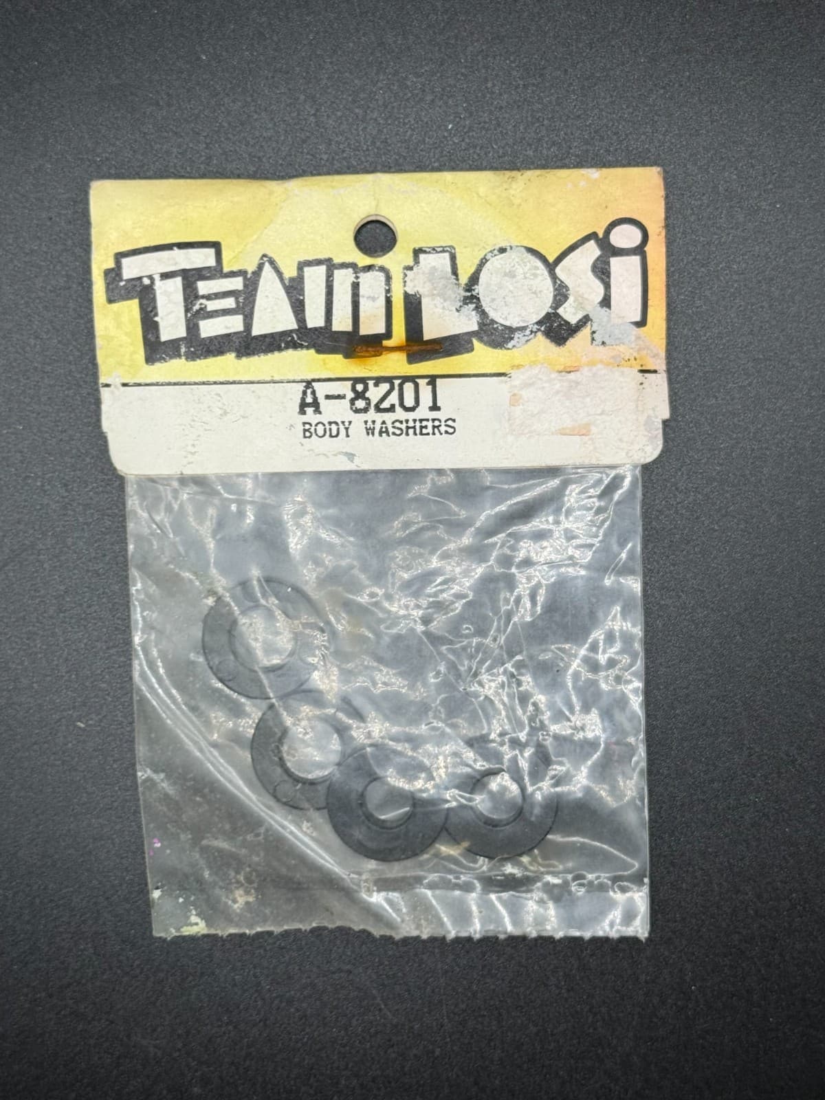 Losi A-8201 Vintage Black Composite Body Washers (Set of 4) JRX, LXT, XX - Image 1