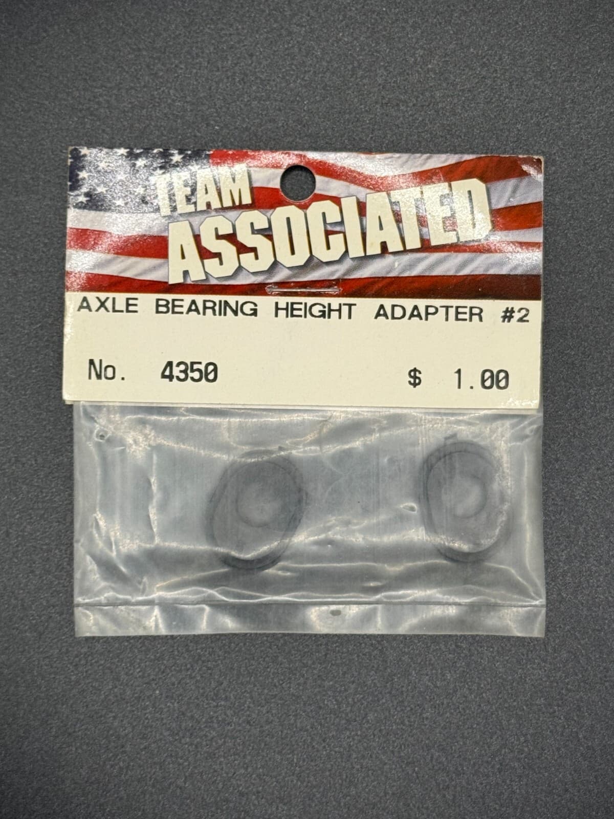 Team Associated Vintage 4350 Axle Bearing Height Adapters RC10L/12L (Black) - Image 1