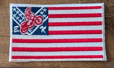 Official Evel Knievel Museum Embroidered Patch American Flag w/ Motorcycle Jump - Image 1