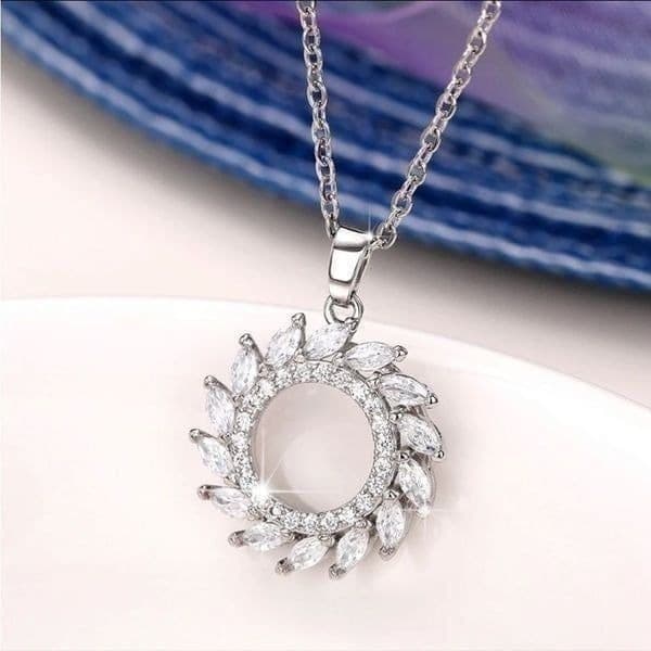 The Infinite Swirl Pendant Necklace in 925 silver and cz - Image 1