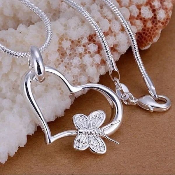The Butterfly Heart Pendant in 925 silver on 18” snake chain. - Image 1