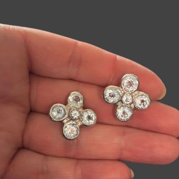 Vintage silver tone earrings with light blue stones - Image 1