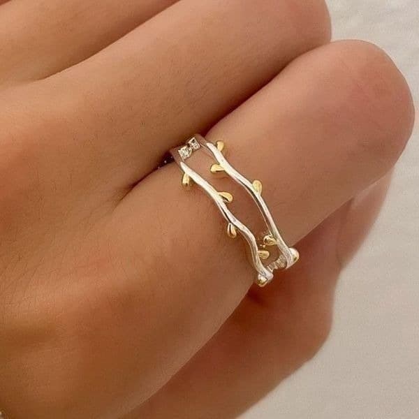 The Dainty Leaf adjustable silver ring with gold accents. - Thumbnail 3