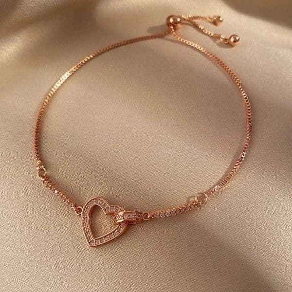 The Rose Gold Heart Chakra Slide Closure bracelet with heart pendant. - Thumbnail 4