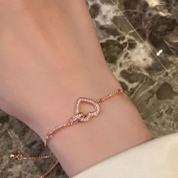 The Rose Gold Heart Chakra Slide Closure bracelet with heart pendant. - Thumbnail 8
