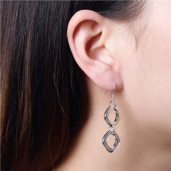 The Geo Drop Dangle earrings in 925 Tibetan Silver - Image 1