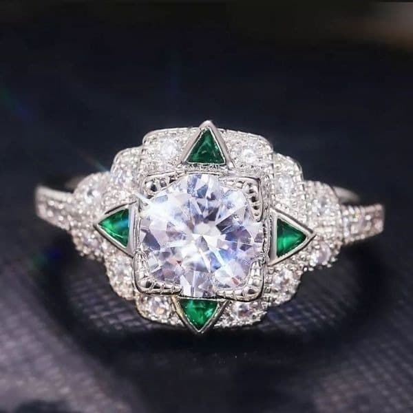 The Welcome To Oz silver and white sapphire cocktail ring w emerald accents - Thumbnail 2
