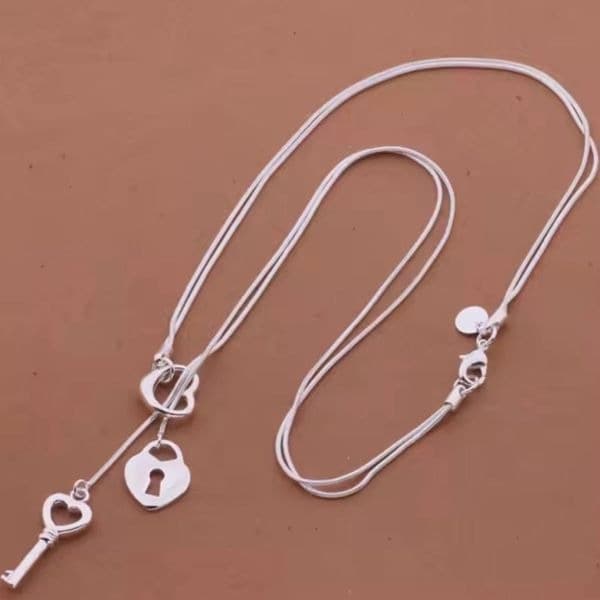Unlock my heart charm necklace with heart, lock and key in 925 - Image 1
