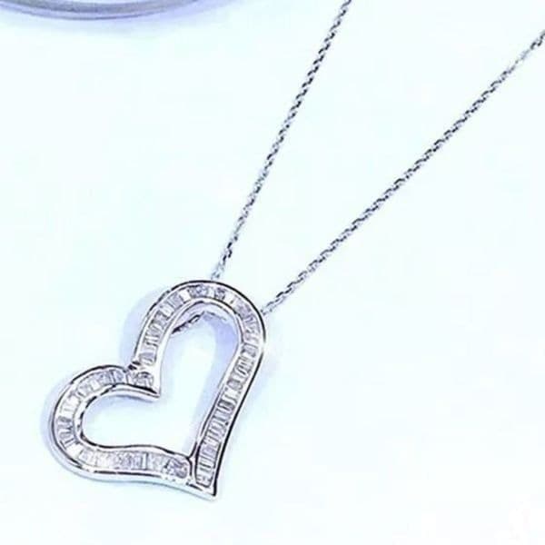 The Beating Heart white Sapphire & sterling heart necklace - Image 1