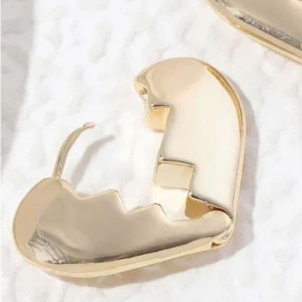 The Heart Chakra huggie earrings in 925 silver with yellow 14k plating - Thumbnail 5