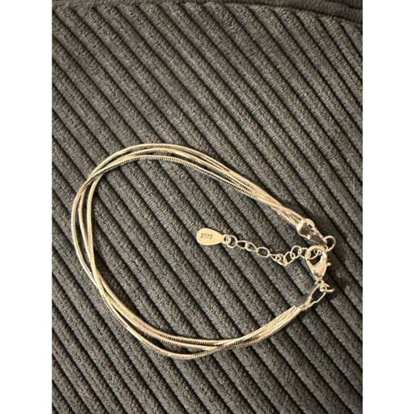 The triple delicate chain bracelet in silver - Thumbnail 3