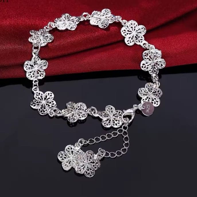 The Boho Flower sterling silver bracelet with dangling flowers - Image 1