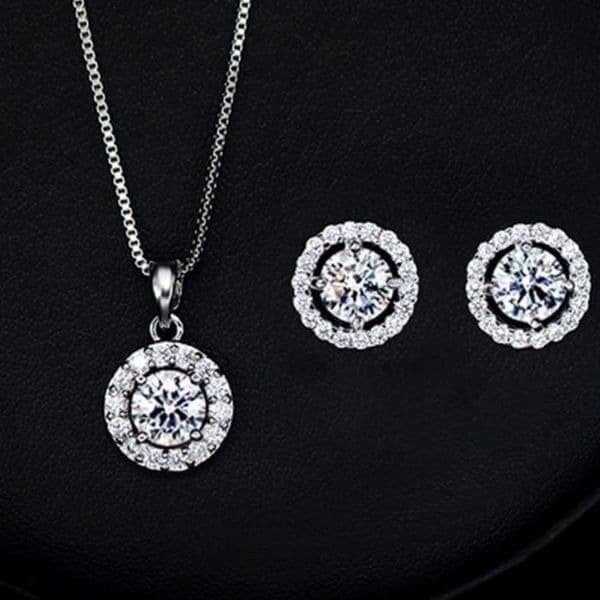 The Dainty Solitaire pendant necklace and stud earrings set in sterling silver - Thumbnail 5