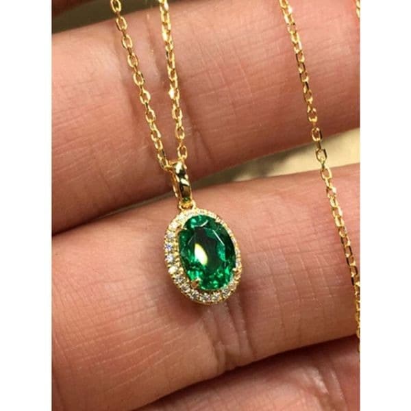 The oval emerald pendant necklace plated in 18k gold with lab created stones - Image 1