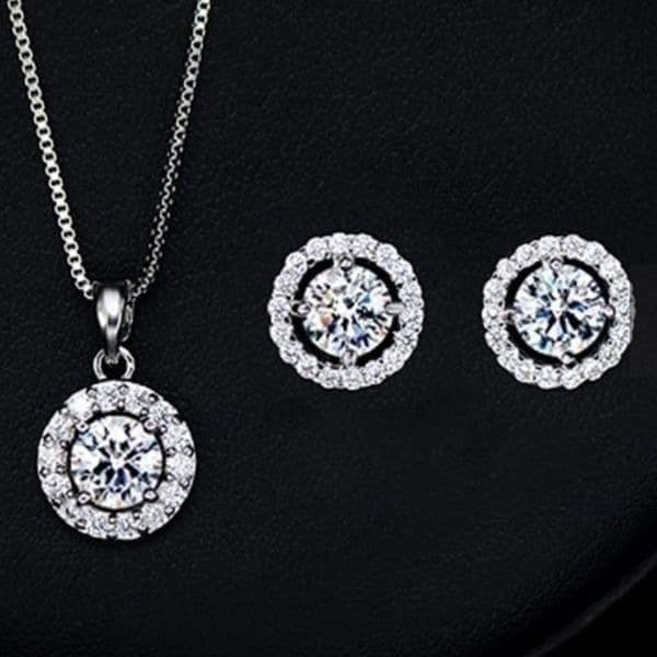 The Dainty Solitaire pendant necklace and stud earrings set in sterling silver - Thumbnail 4