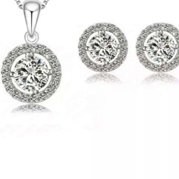 The Dainty Solitaire pendant necklace and stud earrings set in sterling silver - Thumbnail 2