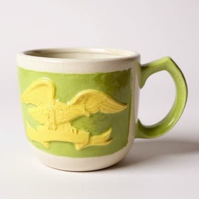 Vintage 1970s Patriotic American Eagle Raised Relief Ceramic Mug Green Yellow - Image 1