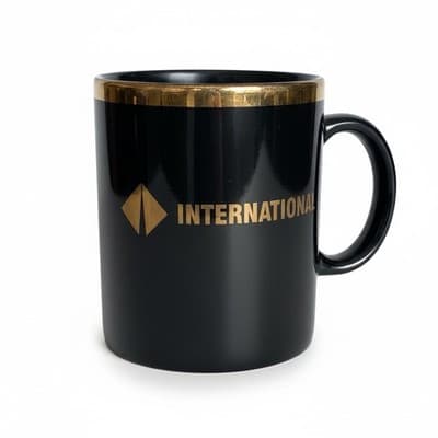 Vintage International Logo Black Coffee Mug Gold Rim Linyi Made in China - Image 1