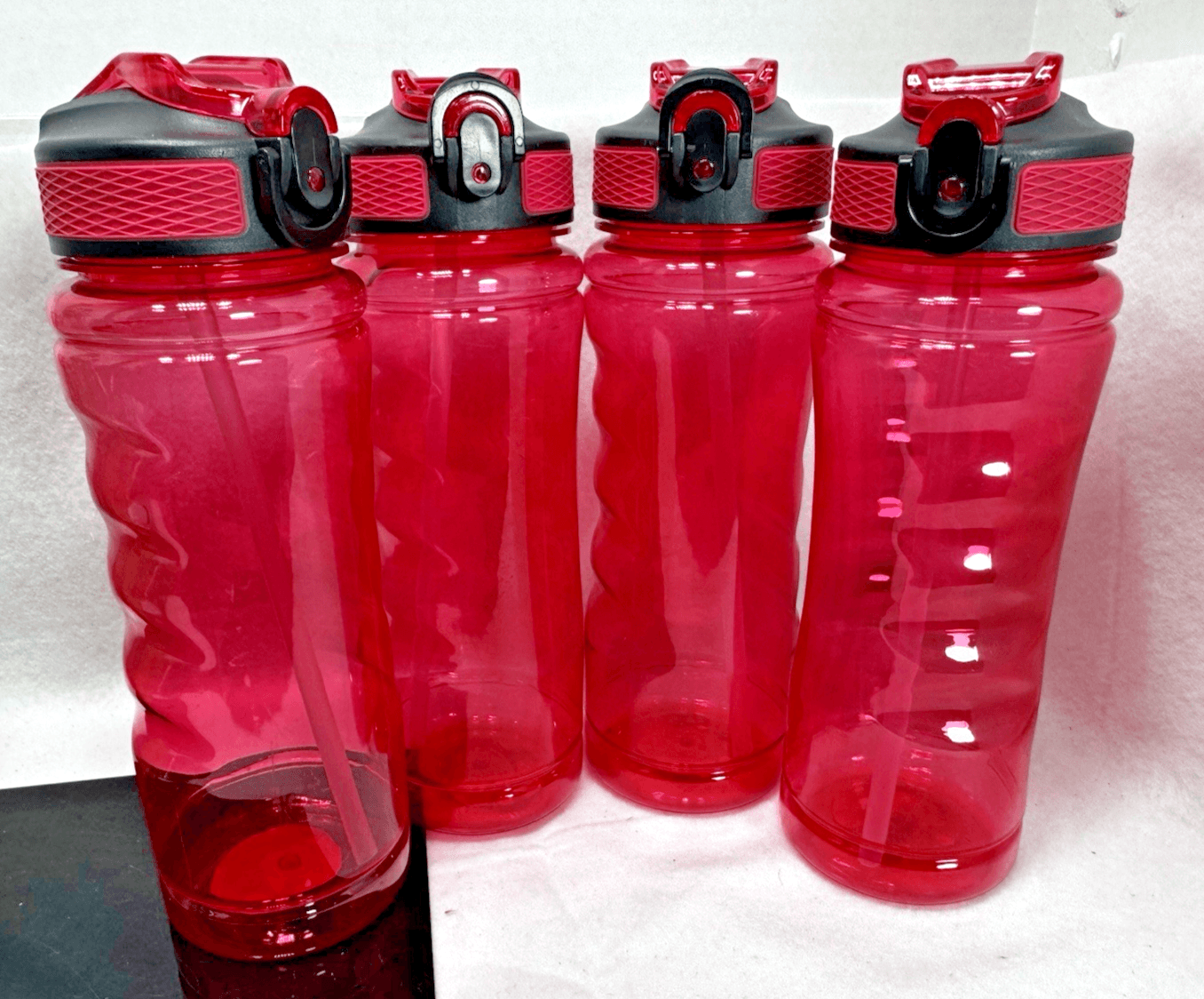 4 Assorted Plastic Water Bottles with Flip Top Lids 28.2 Oz, BPA Free Reusable - Image 1