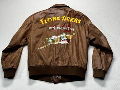 Good Condition WINLIT Made in the KOREA AMERICAN VOLUNTEER GRP Brown Size M - Image 1