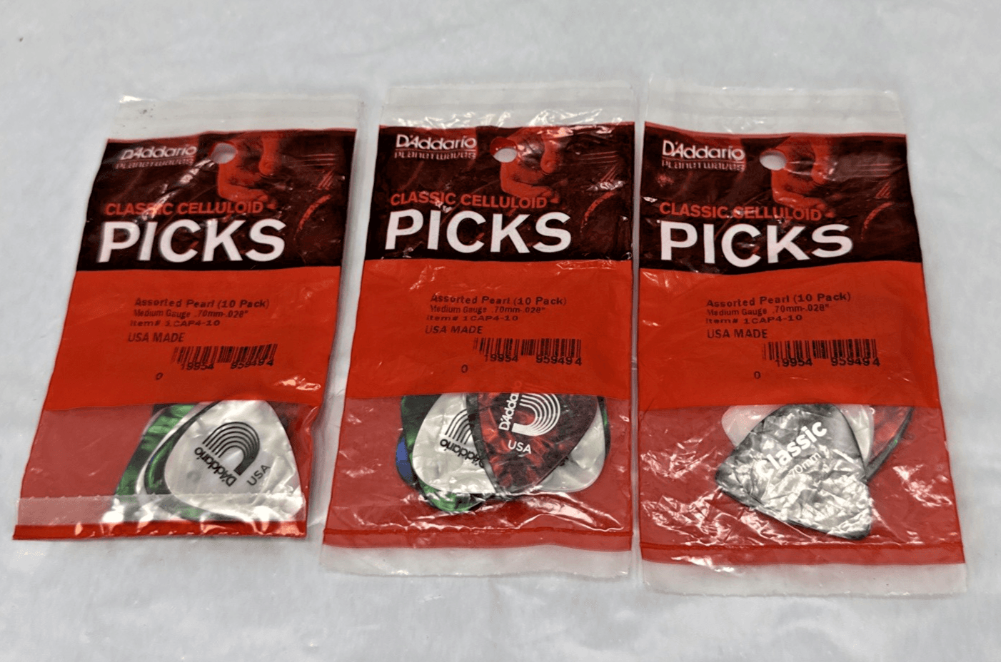 3 Packs D'Addario Assorted Pearl Celluloid Guitar Picks 10 pack Medium 1CAP4-10 - Image 1