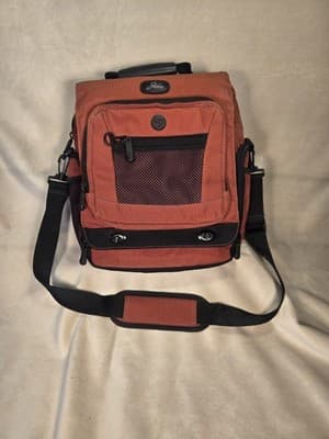 Skyway Luggage Burnt Orange and Black Nylon 13" Travel Bag - Image 1