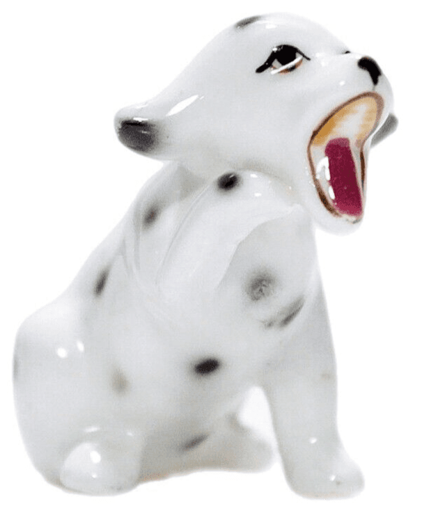 Vintage Hand Painted Porcelain Sitting Playing Dog Hallmarked Figurine - Image 1