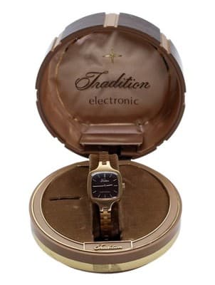 Vintage TRADITION Electronic Burgundy Dial Gold Tone Ladies Wristwatch In Box - Image 1