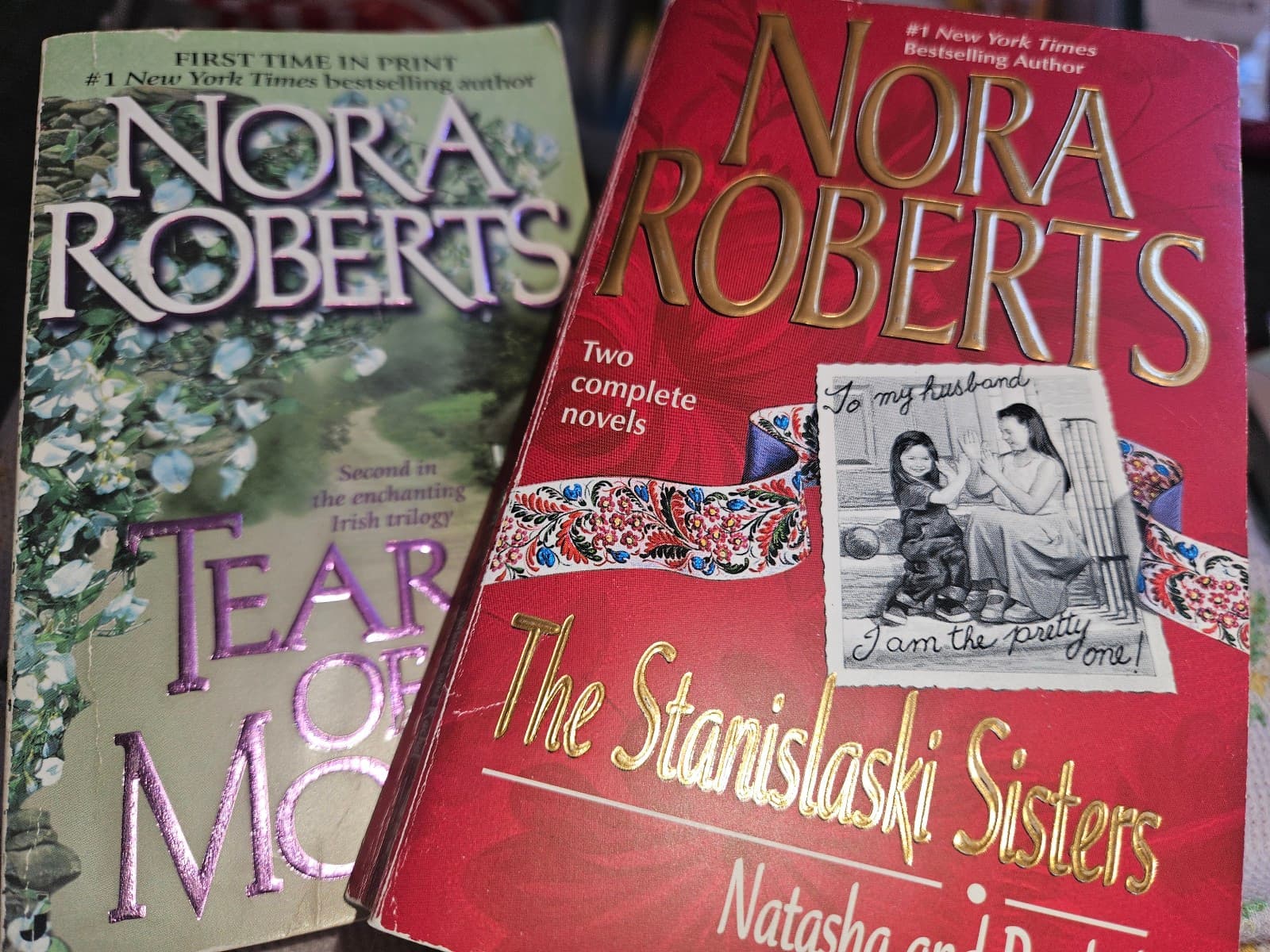 2 Nora Roberts books. Buy 3 book listings, get 1 free - Image 1