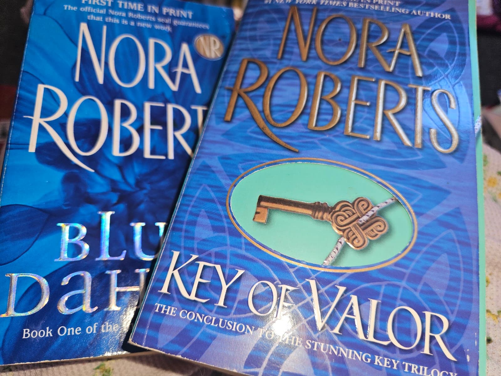 2 Nora Roberts books. Buy 3 book listings, get 1 free - Image 1