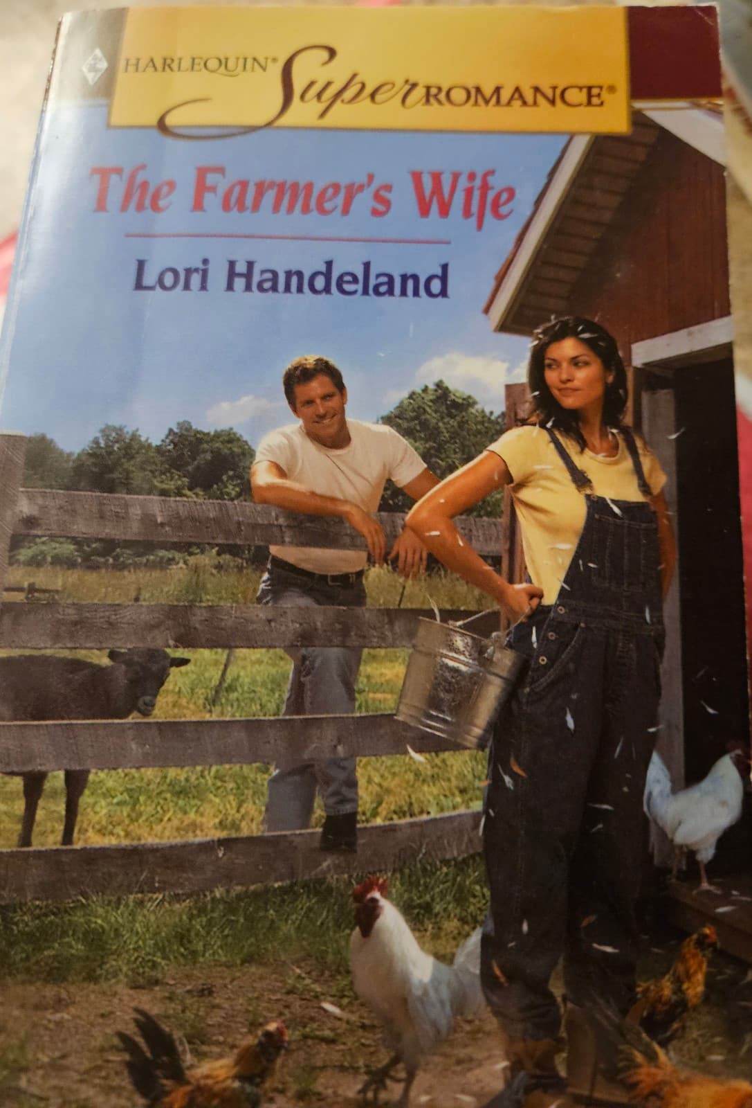 The farmer's wife. Lori Handeland. Buy 1 adult book get 1 ree - Image 1