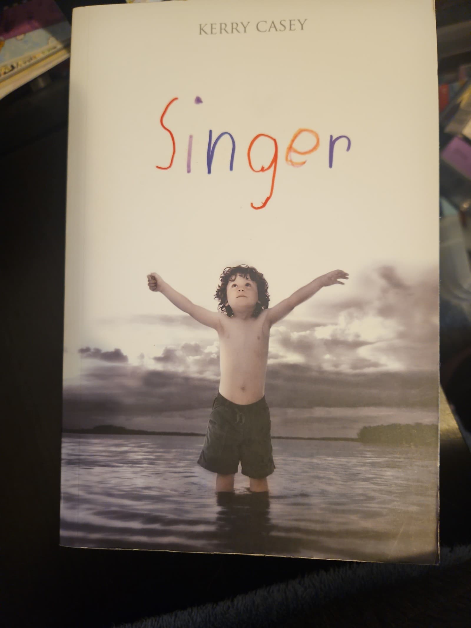Singer. Kerry Casey. Buy 1 adult book get 1 free, or buy 3 of any book, get 1 fr - Image 1