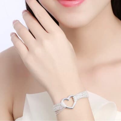 The Enmeshed Heart multi strand heart pendant bracelet in sterling silver. - Thumbnail 4