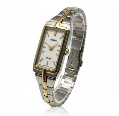 Seiko Solar SUP272 Women's Two-Tone Gold Silver Rectangular Watch NEW