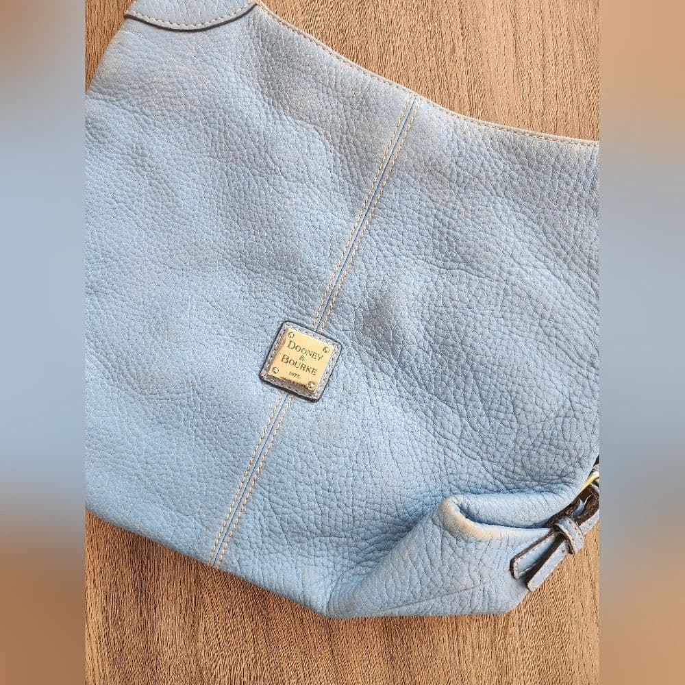 Dooney & Bourke Blue and Gold Shoulder Bag with Elegant Design