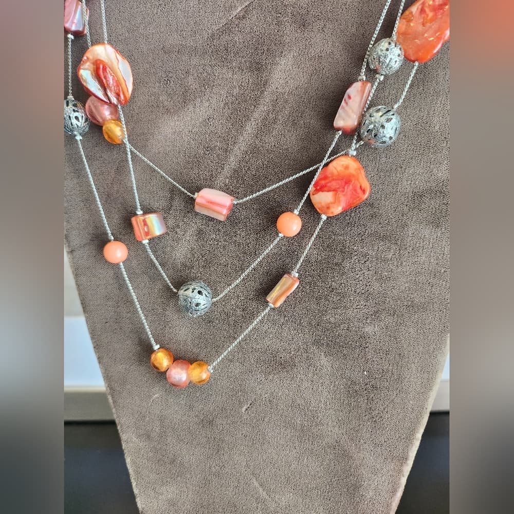 Multi-Strand Silver Necklace with Orange and Pink Accents
