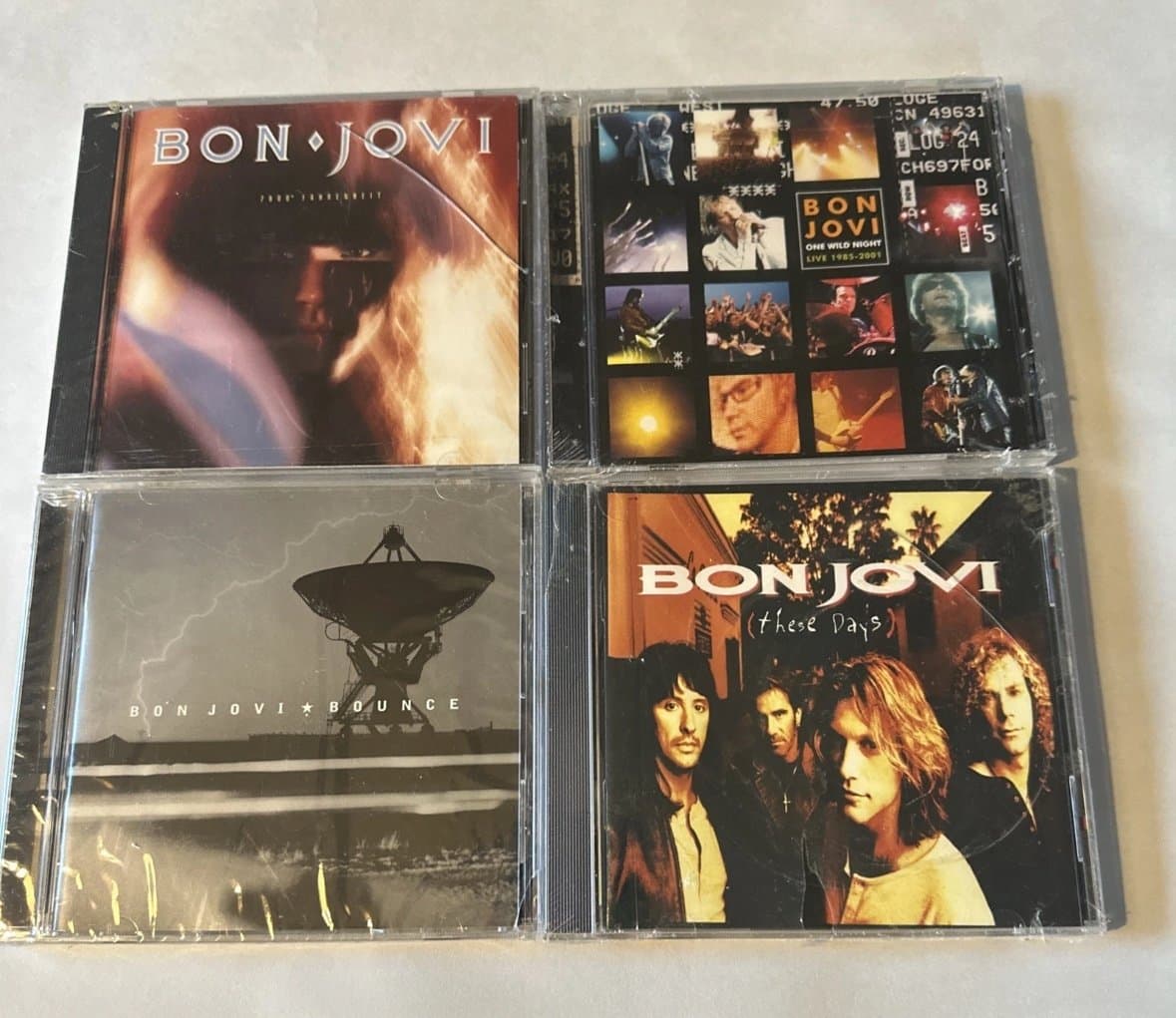 4 New SEALED BON JOVI CD’s 7800° Fahrenheit, One Wild Night, These Days, Bounce