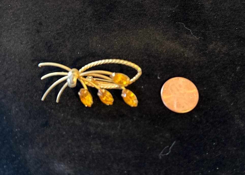 Vintage gold toned orange topaz brooch