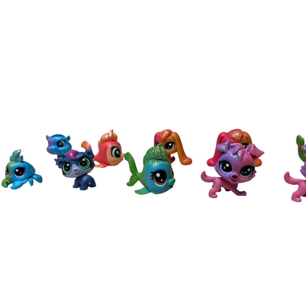 10 Pcs collection of Hasbro Littlest Pet Shop (LPS) mini figures.