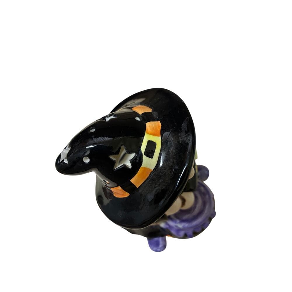 vintage-style ceramic Halloween figurine featuring a witch holding a broom - Thumbnail 3