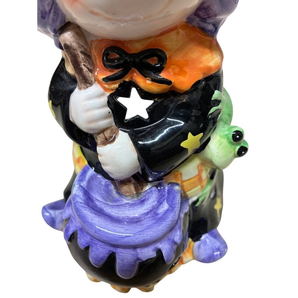 vintage-style ceramic Halloween figurine featuring a witch holding a broom - Thumbnail 4