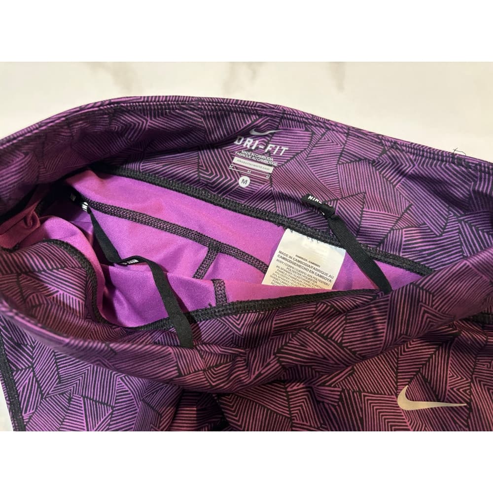 Nike Dri-FIT running leggings in a purple and black - Thumbnail 4