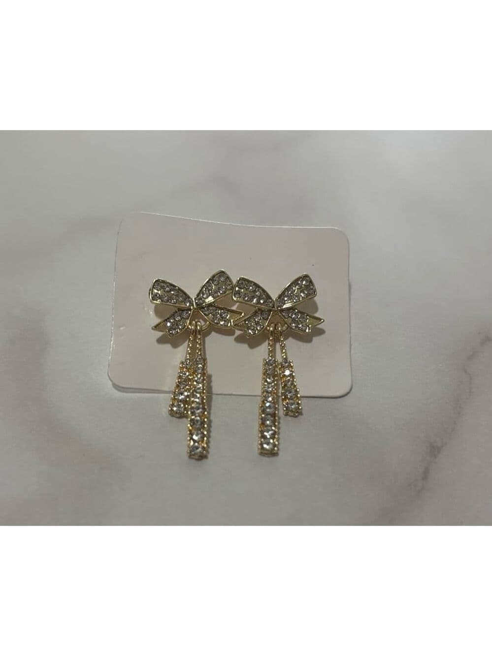 Bow dangling earrings